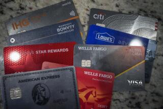 FILE - A variety of credit cards are shown on Jan. 18, 2024, in Atlanta. Seriously overdue credit card debt is at the highest level in 14 years, and people 35 and under are struggling more than other age groups to pay their bills. (AP Photo/Mike Stewart, File)