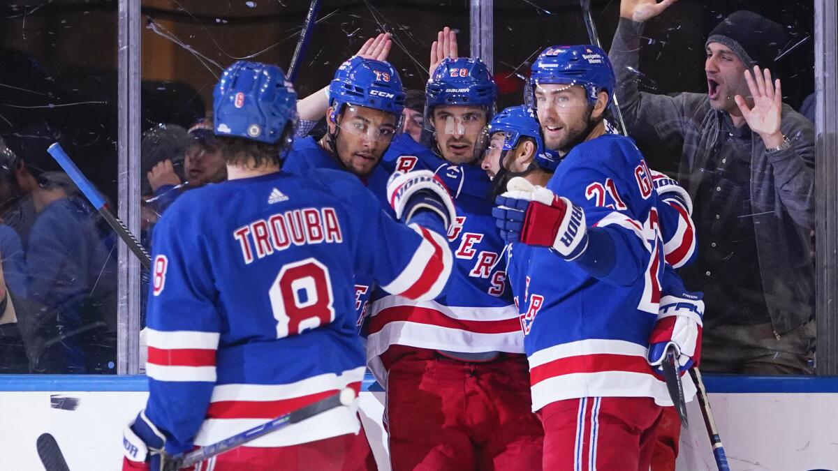 Hughes has 3 points in 2nd period as Devils beat Rangers 4-3 - The San  Diego Union-Tribune