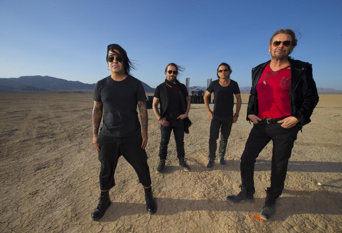 The Mexican rockers of Maná hit the Mojave Desert's Lucerne Dry Lake to shoot the video for their single, "La Prisión." The band will be playing a pair of shows at the Staples Center this week.