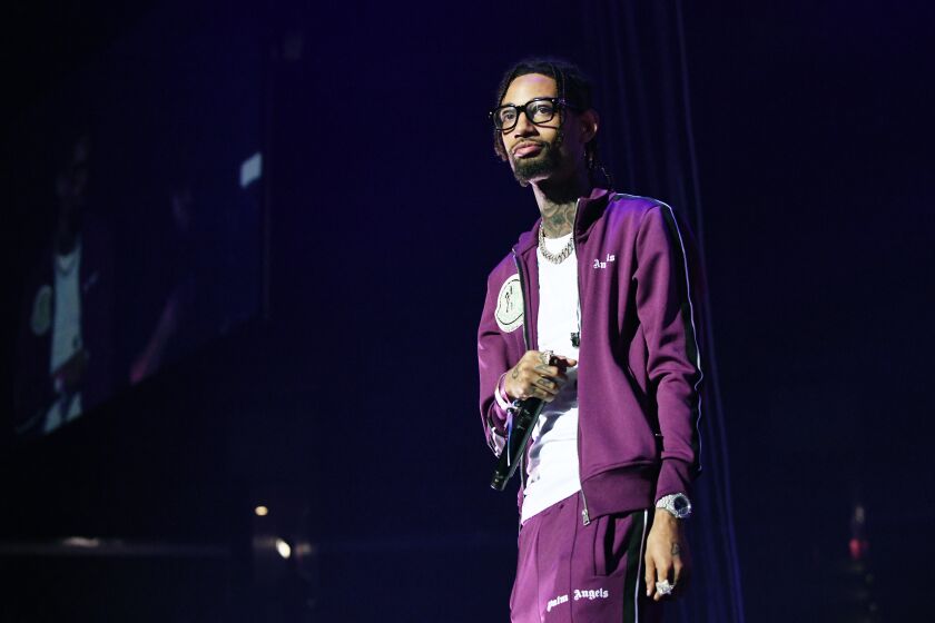 LOS ANGELES, CALIFORNIA - JUNE 22: PnB Rock performs onstage at the STAPLES Center Concert Sponsored By Sprite during BET Experience at Staples Center on June 22, 2019 in Los Angeles, California. (Photo by Michael Kovac/Getty Images for BET)