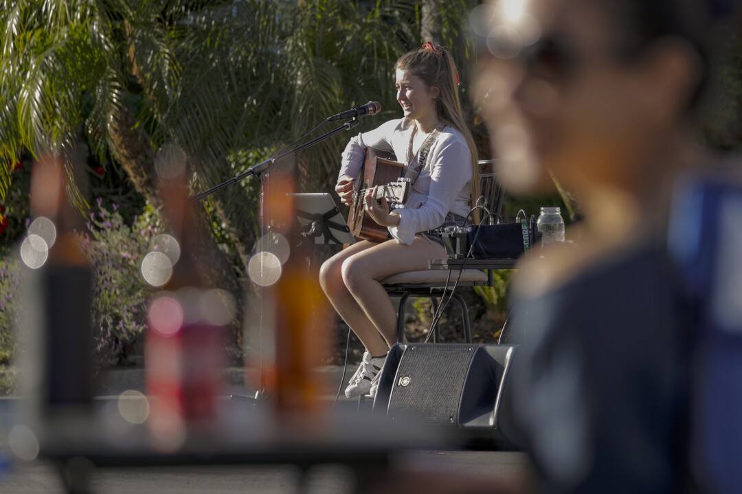 Two years ago, she competed on 'The Voice.' Now she's the
star of a coronavirus block party 5 Upland cul-de-sac concert