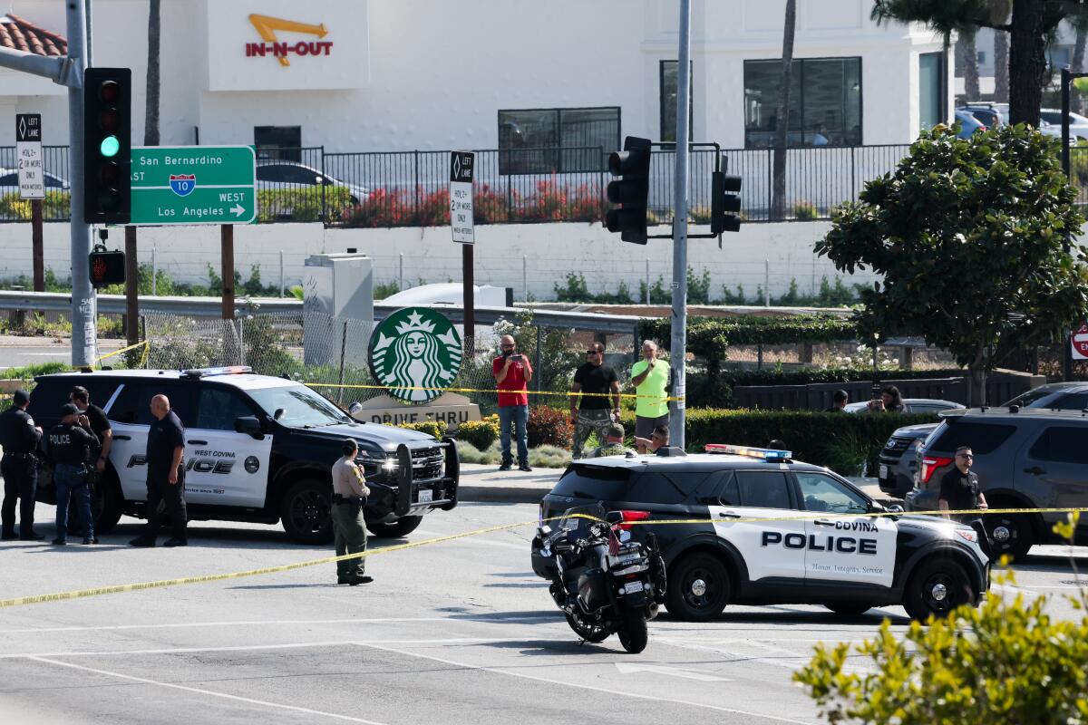 Police investigate a shooting near the 10 Freeway in West Covina.