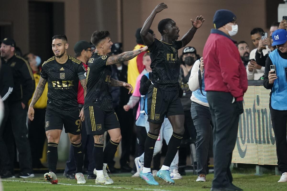 LAFC defender Mamadou Fall celebrates after scoring during the second half.