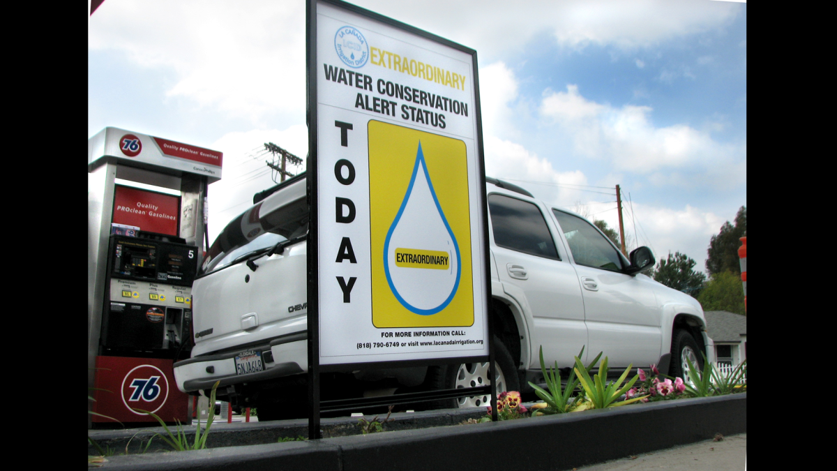 A sign at the Union 76 gas station on Foothill Blvd. in La Cañada Flintridge notifies passersby of the need to conserve water amid the drought.