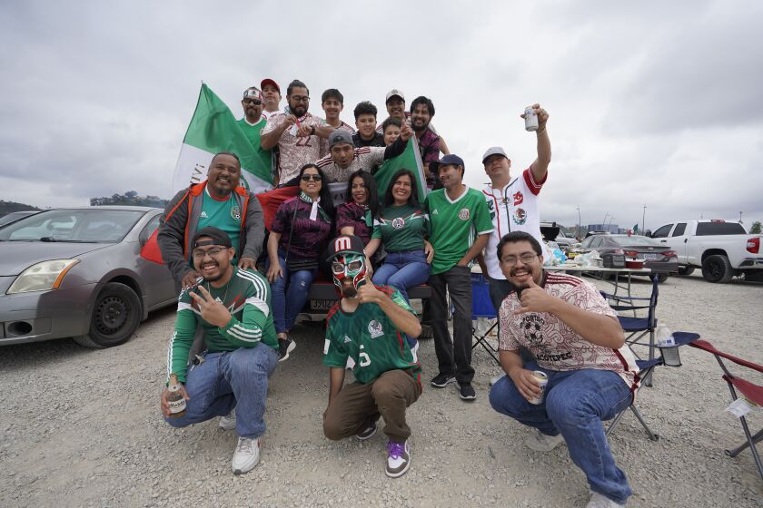 San Diego, California - June 10: Fans tailgate out in the parking lot. Mexico faces Cameroon as part of the MexTour soccer series at Snapdragon Stadium on Saturday, June 10, 2023 in San Diego, California. (Alejandro Tamayo / The San Diego Union-Tribune)