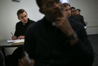 ADVANCE FOR SUNDAY, FEB 16 - Seminarian Daniel Rice, left, sits with classmates during a lesson on the Gospel of Luke at St. Charles Borromeo Seminary in Wynnewood, Pa., on Wednesday, Feb. 5, 2020. Future Catholic priests remain unflinchingly optimistic despite scandals that have driven faithful from the pews. (AP Photo/Wong Maye-E)