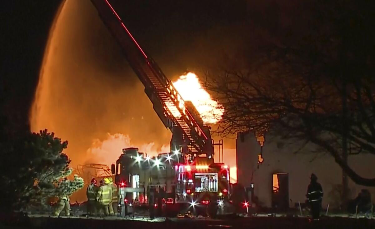 Firefighters battling an industrial fire in the Detroit suburb of Clinton Township