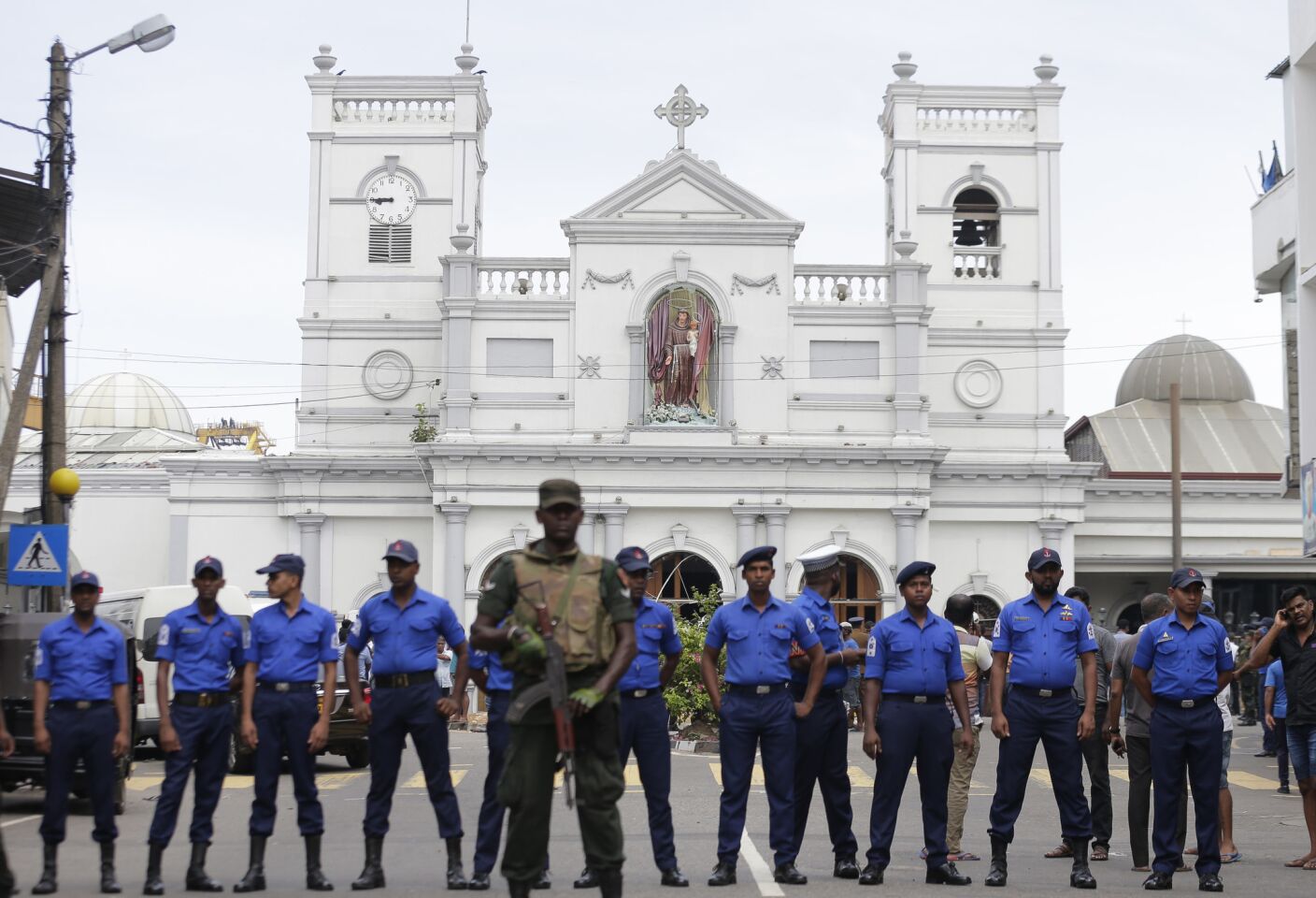 Sri Lankan soldiers secure the area around St. Anthony's Shrine after an April 21 explosion in Colombo.