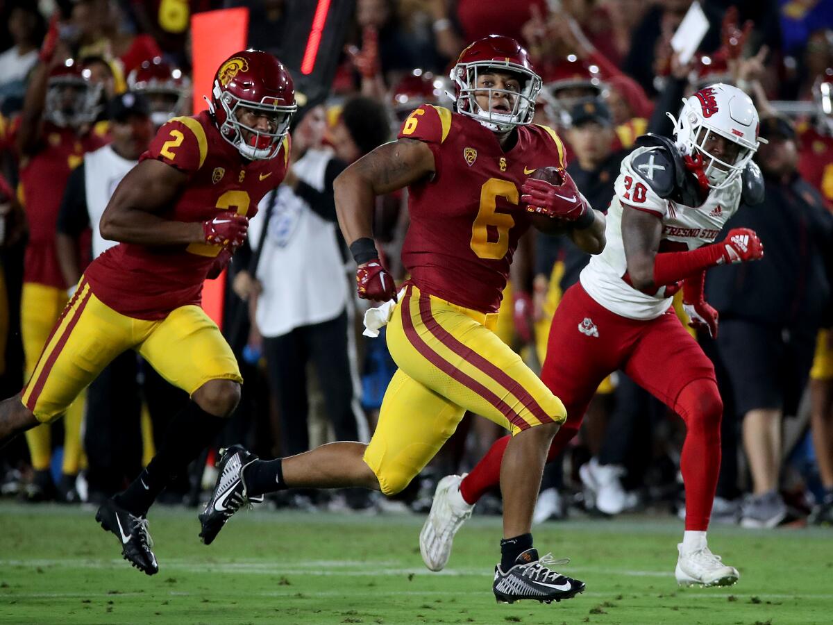 USC running back Austin Jones breaks away for a 44-yard gain against Fresno State.