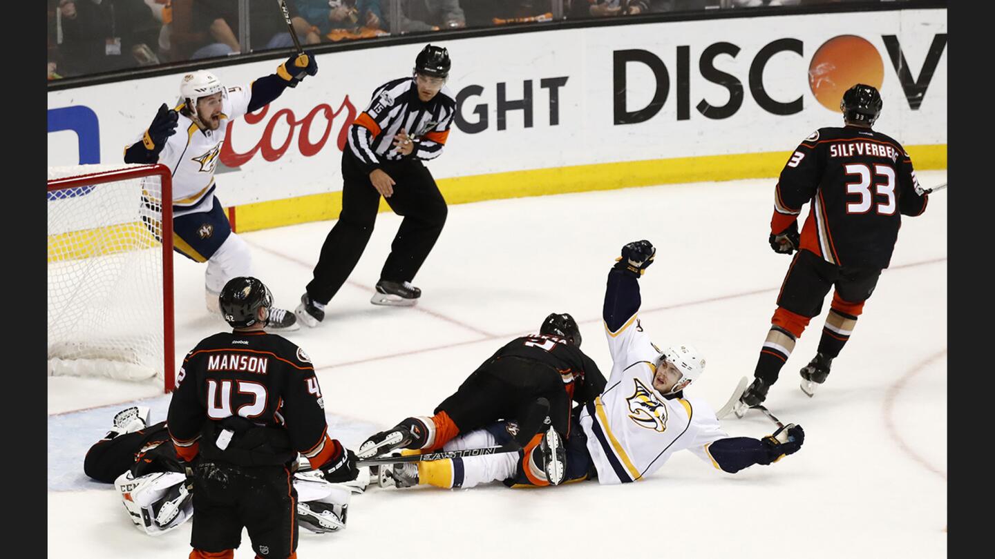 Predators forward Pontus Aberg celebrates after getting the puck past Ducks goaltender Jonathan Bernier to give Nashville a 2-1 lead in Game 5 of the Western Conference finals.