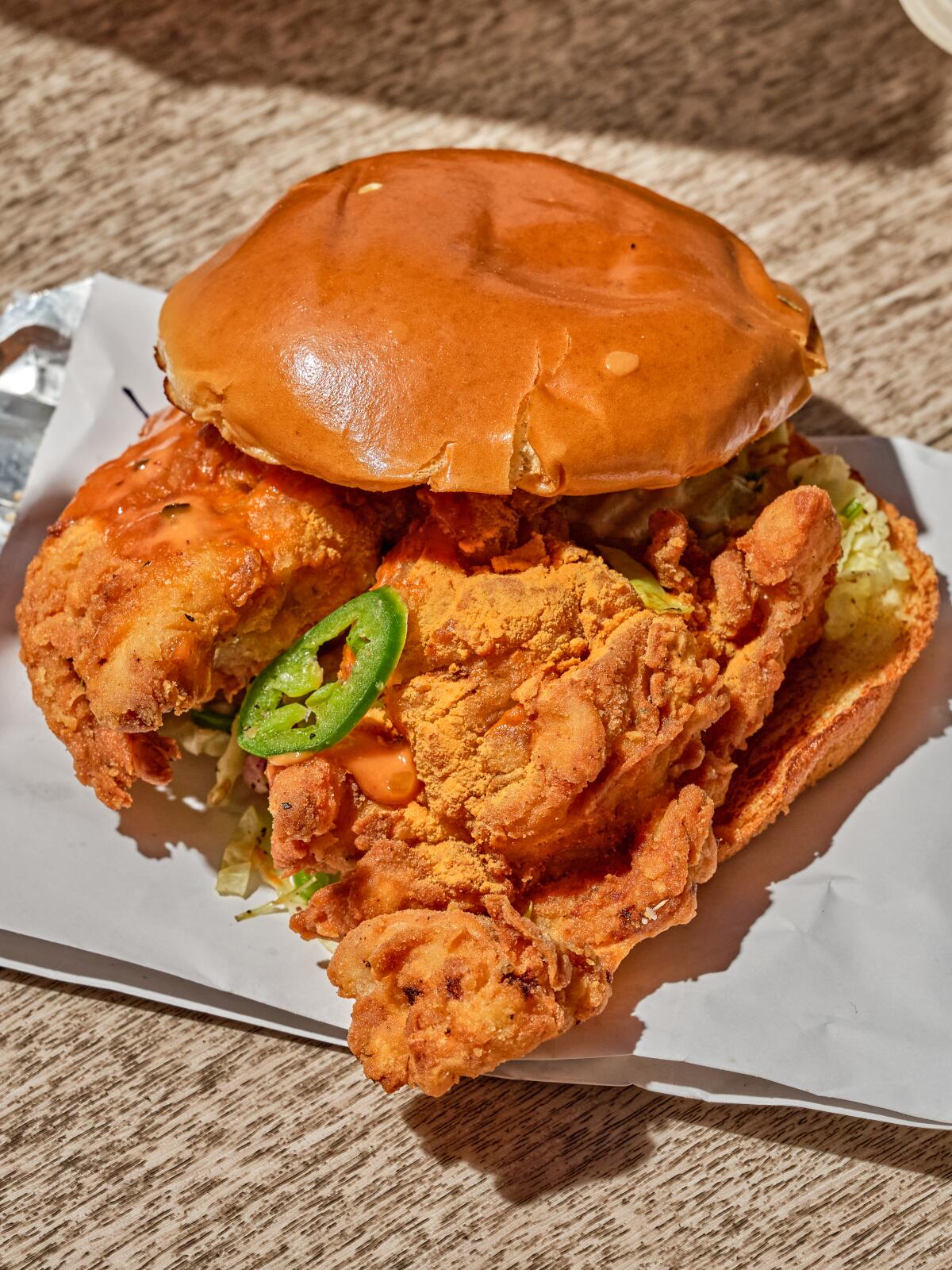 The Ludo Bird dark meat fried chicken sandwich from Staples Center.