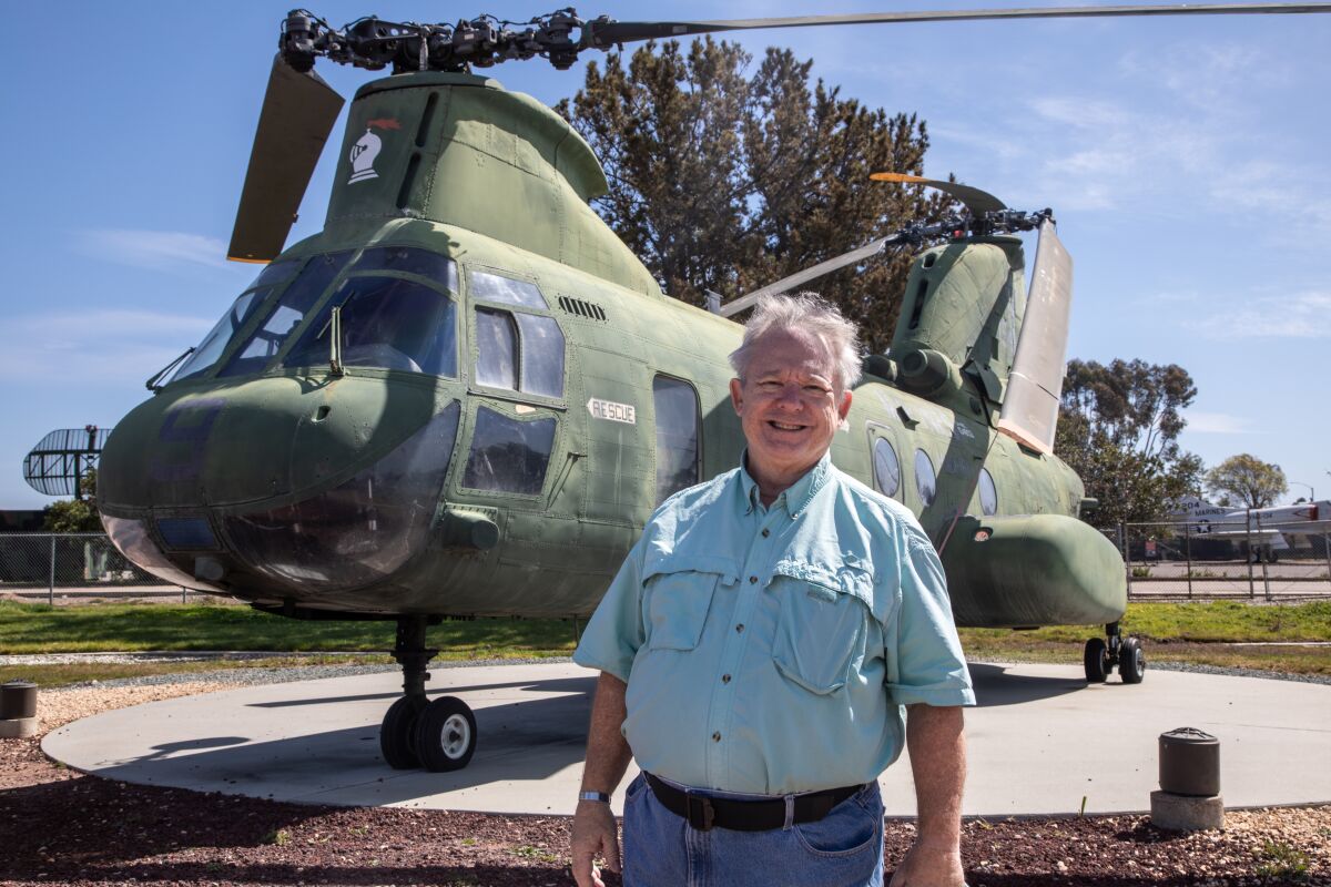 Chuck Meadows poses with the Boeing Vertol CH-46 Sea Knight
