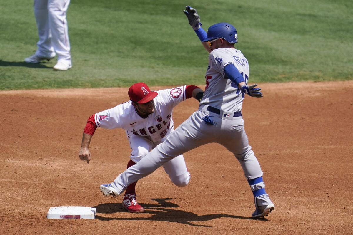 Angels shortstop David Fletcher tags out Dodgers' Matt Beaty. 