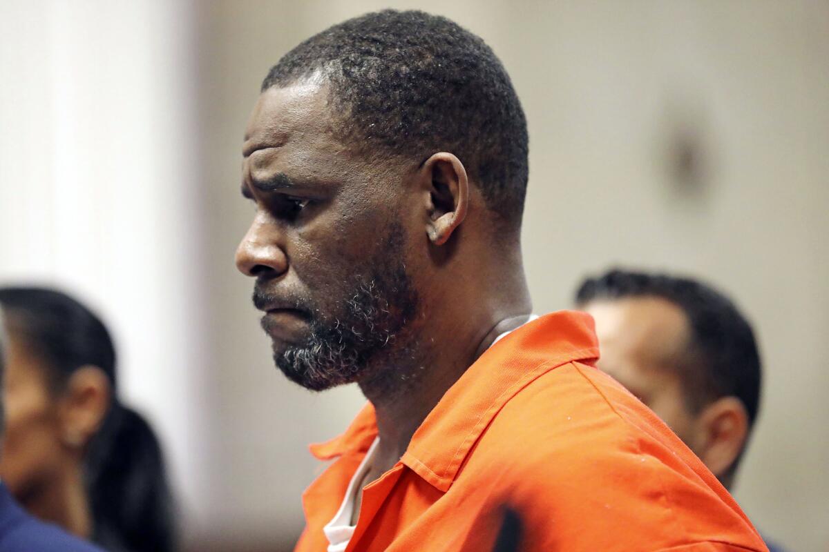 FILE - R. Kelly appears during a hearing at the Leighton Criminal Courthouse in Chicago, Sept. 17, 2019. Federal authorities are pushing back Saturday, July 2, 2022, on R. Kelly's claims that he was placed on suicide watch as a form of punishment after a judge sentenced him to 30 years behind bars for using his fame to sexually abuse young girls. (Antonio Perez/Chicago Tribune via AP, Pool, File)