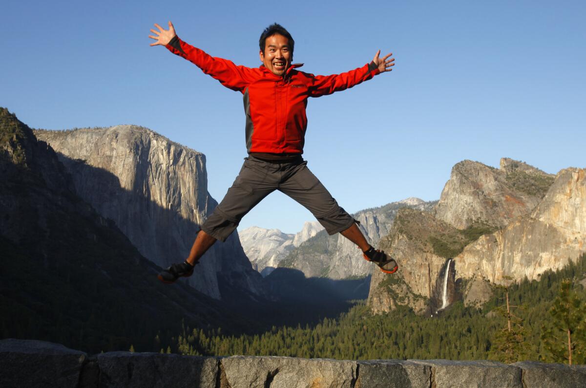 Making his first visit to Yosemite National Park, Kinihiko Kosuge of Georgia jumps in the air for a photo at Yosemite Valley's Tunnel View viewpoint on May 18, 2013.