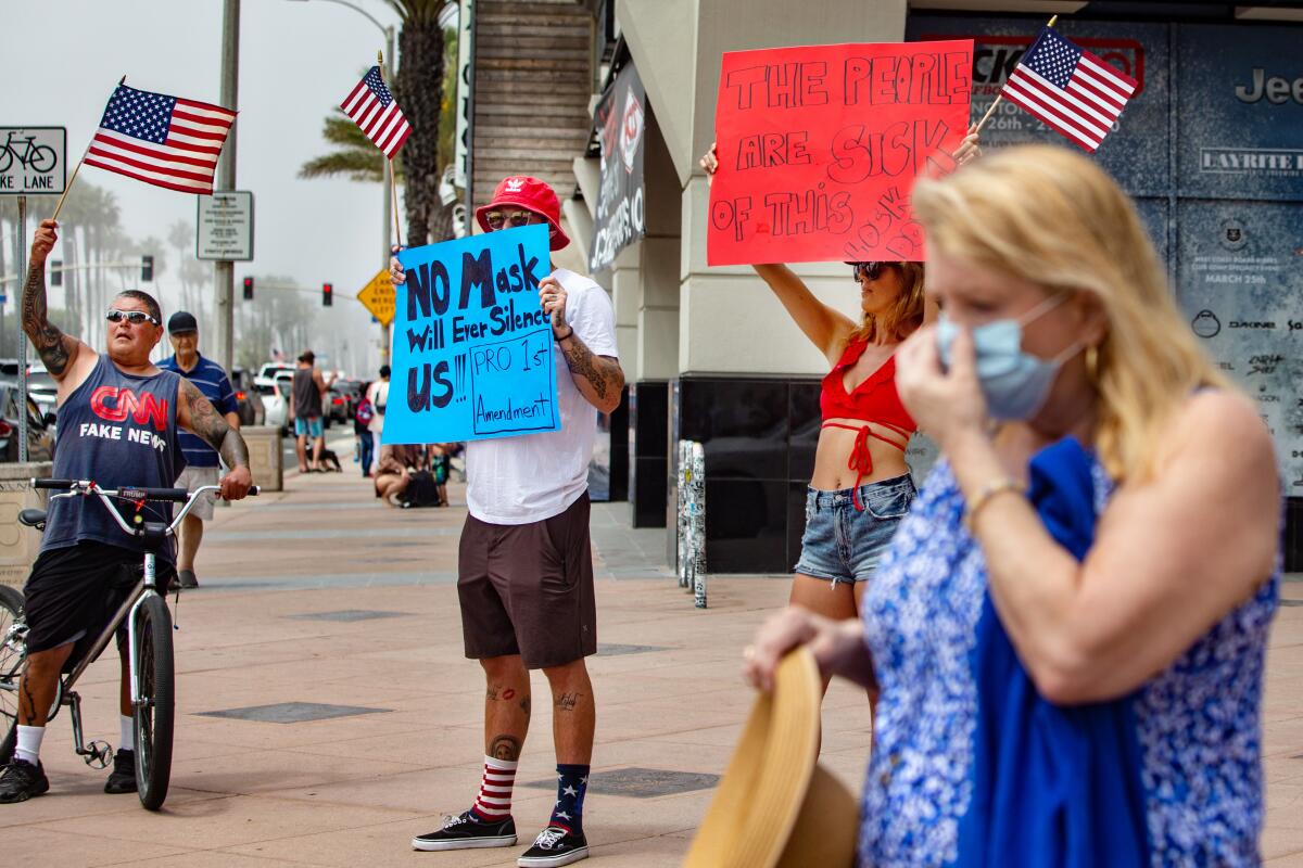 Demonstrators protest California lockdown at Huntington Beach