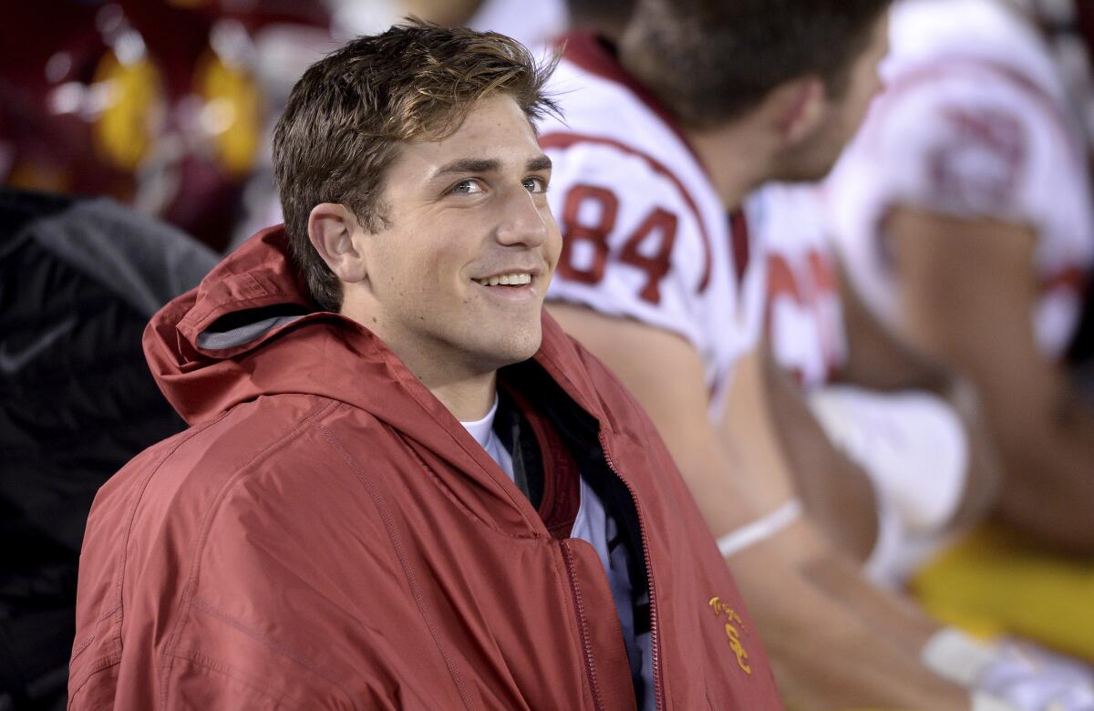 USC quarterback Kedon Slovis looks on from the sideline after being removed because of injury during the second half of the Holiday Bowl against Iowa on Dec. 27, 2019.