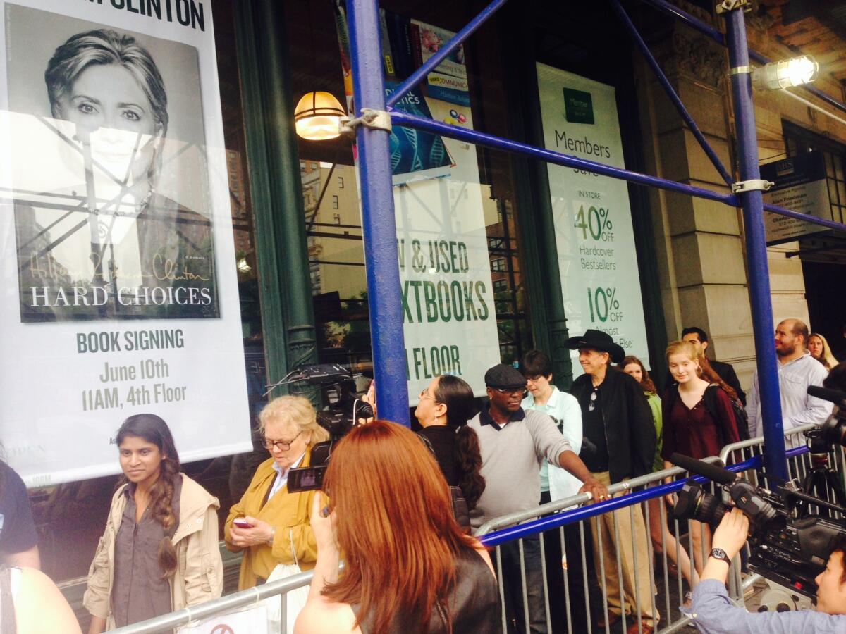 New Yorkers stand in line to buy Hillary Clinton's new book.
