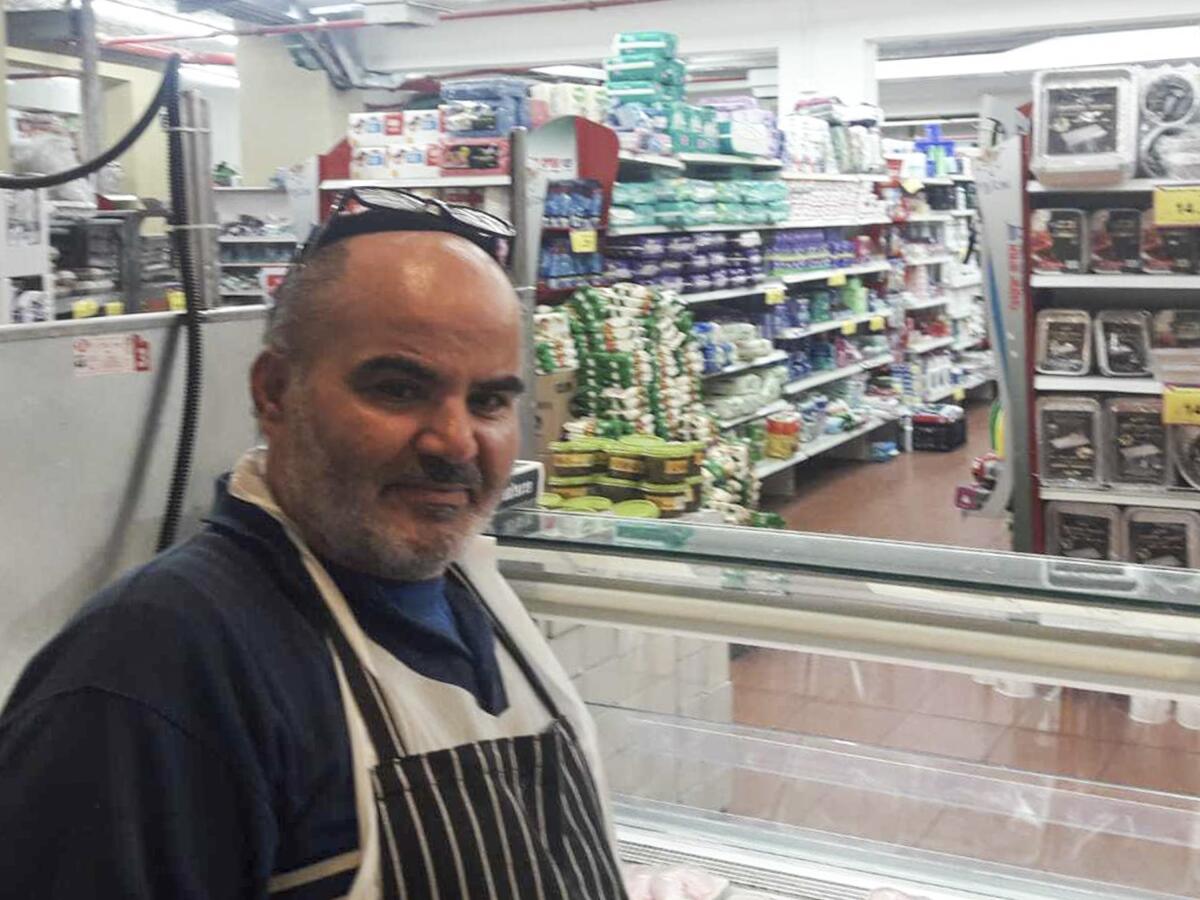 David Ben-Avraham at a supermarket in the Israeli town of Beit Shamesh in 2021, where he briefly worked.