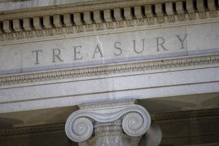 FILE- This photo shows the U.S. Treasury Department building at dusk in Washington, June 6, 2019. (AP Photo/Patrick Semansky, File)