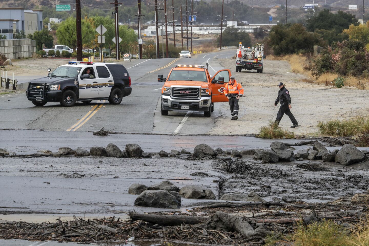 Storm rolls across fire-scarred regions of California