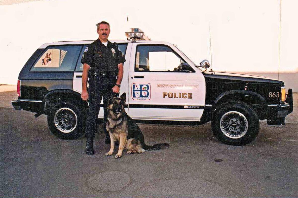 Officer Jim Weaver with K9 Kim, who died in the line of duty on May 26, 1991, after being stabbed during a police pursuit.