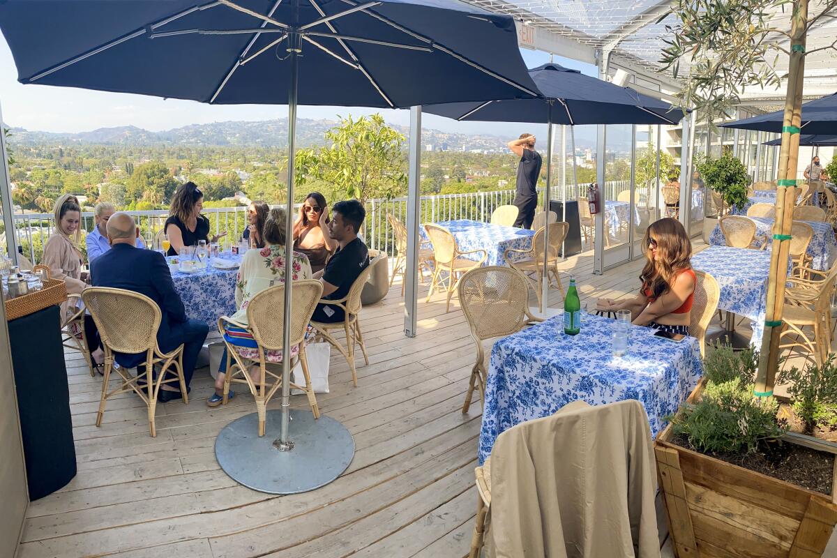 The view from the patio at h.wood's Sant'olina at the Beverly Hilton.