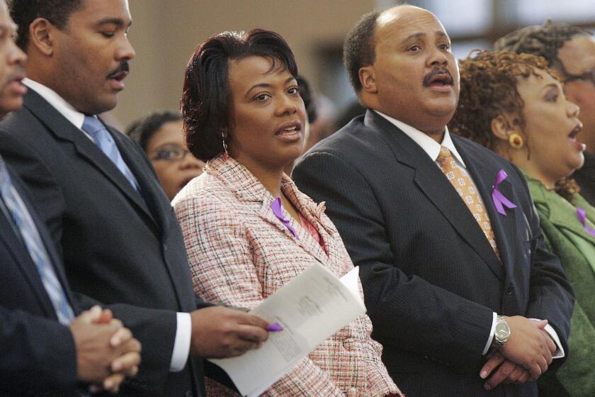 Dexter King, left, Bernice King and Martin Luther King III, shown at a 2006 tribute to their mother, Coretta Scott King, are now in a court dispute over the Bible and Nobel Peace Prize belonging to their father, Martin Luther King Jr.