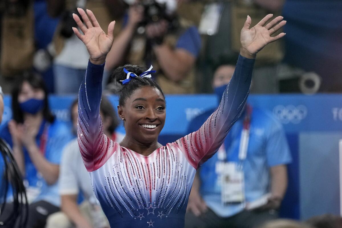 Simone Biles returns to competition and gets beam bronze - The San