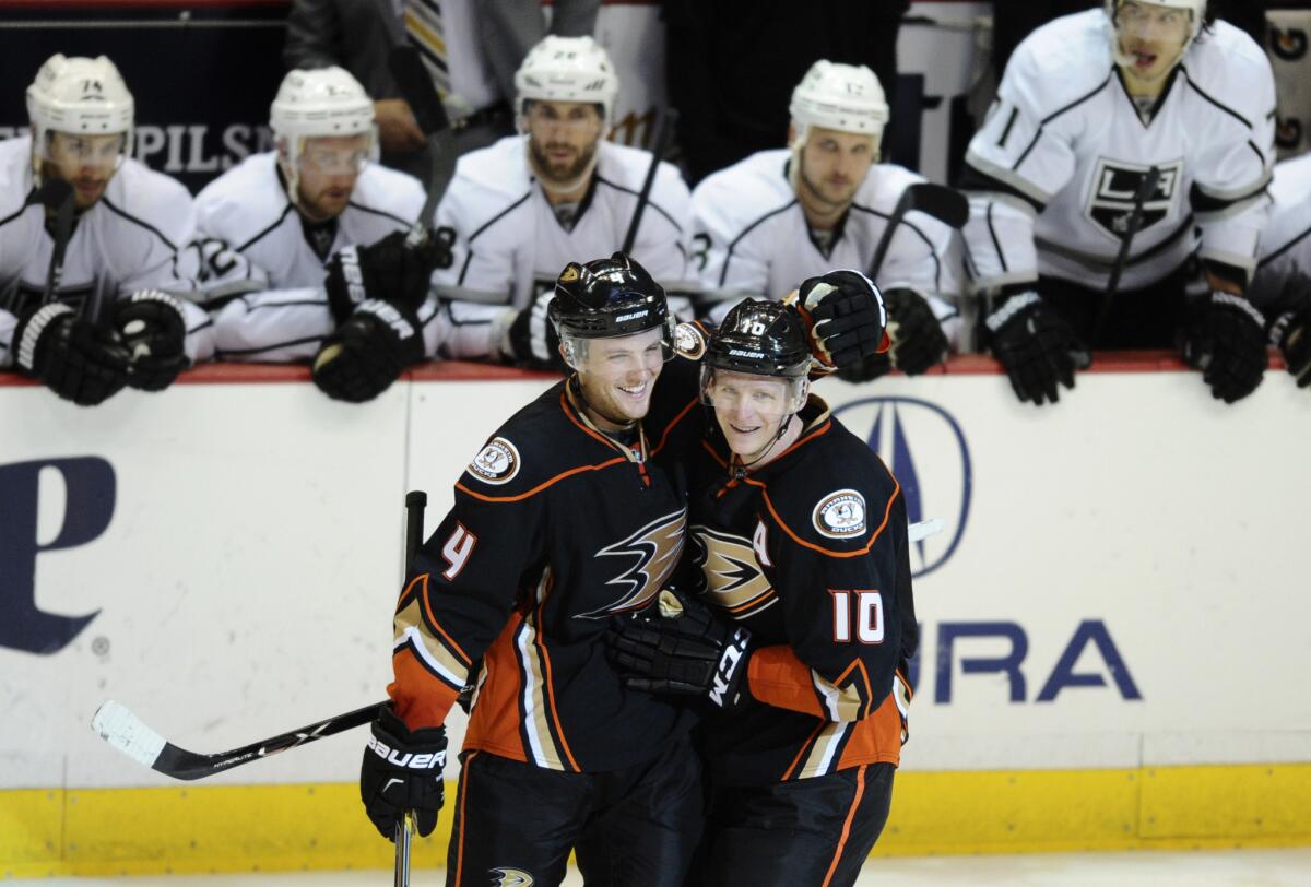 Ducks right wing Corey Perry (10) by defenseman Cam Fowler after scoring the final goal in a 4-2 victory over the Kings on Friday night at Honda Center in Anaheim.