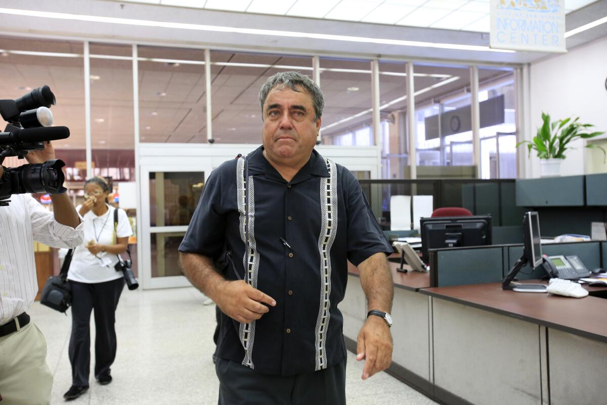 Enrique Morones arrives at San Diego City Hall.