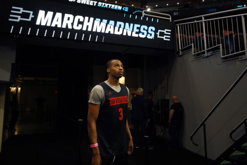 Louisville, KY - March 23: San Diego State's Micah Parrish walks into the arena for a practice in Louisville on Thursday, March 23, 2023. The Aztecs face Alabama in a Sweet 16 game. (K.C. Alfred / The San Diego Union-Tribune)