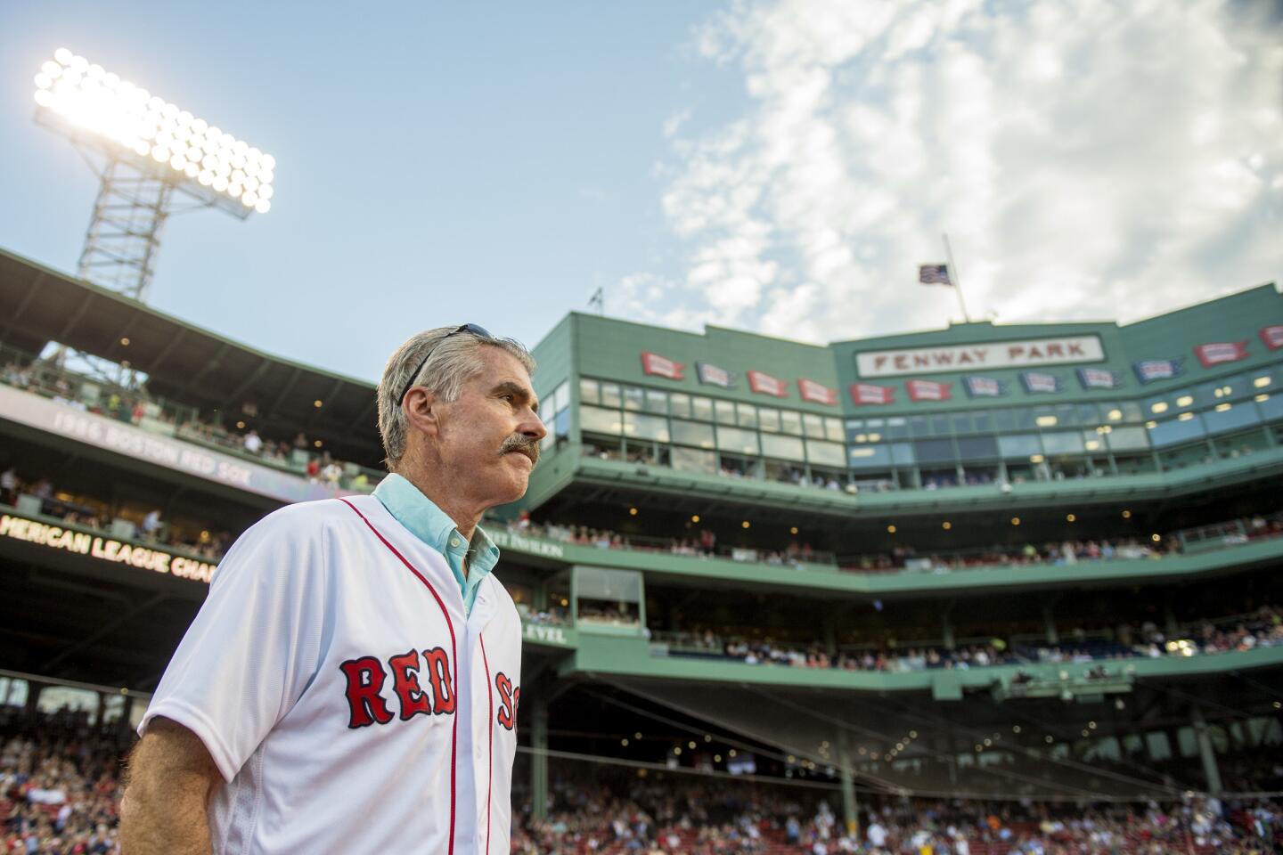 Former Boston Red Sox player Bill Buckner is introduced during a 1986 20-year team reunion before a game between the Boston Red Sox and the Colorado Rockies on May 25, 2016, at Fenway Park in Boston.