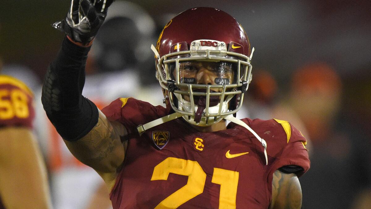 USC linebacker Su'a Cravens gestures during a win over Oregon State at the Coliseum on Sept. 27.