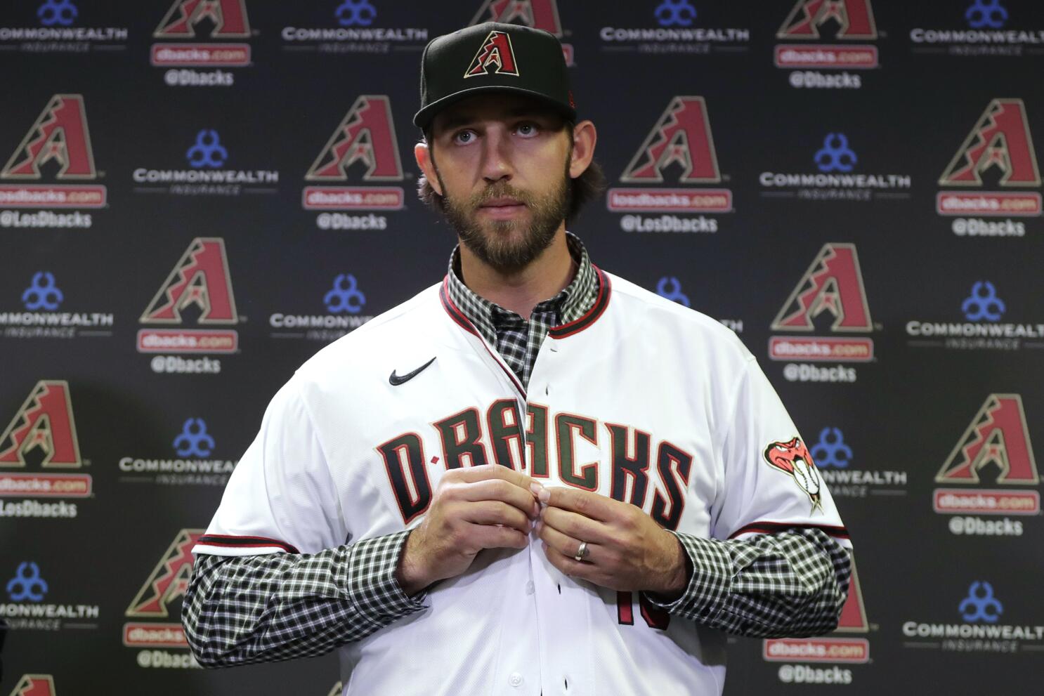 In a battle of pitchers hitting, Madison Bumgarner appeared as a pinch- hitter