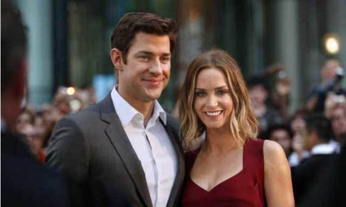 John Krasinski and Emily Blunt attend the premier of her film "Looper," a futuristic action thriller, at the Toronto Film Festival in early September.