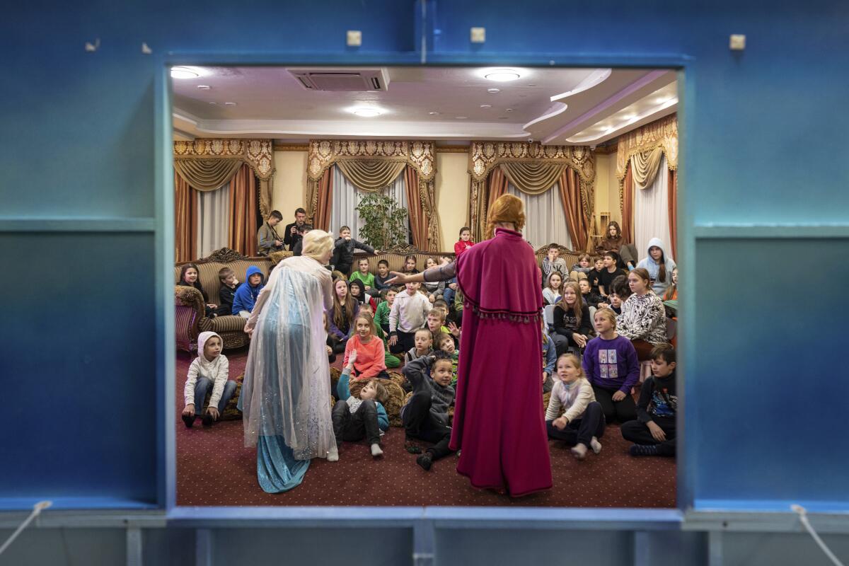 Actors performing for young children in Kyiv, Ukraine