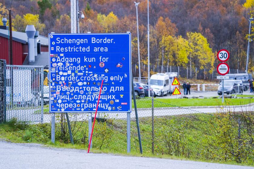 FILE - A sign indicating the Storskog border crossing between Russia and Norway is pictured near Kirkenes, Norway, on Sept. 28, 2022. (Lise Aserud/NTB Scanpix via AP, File)