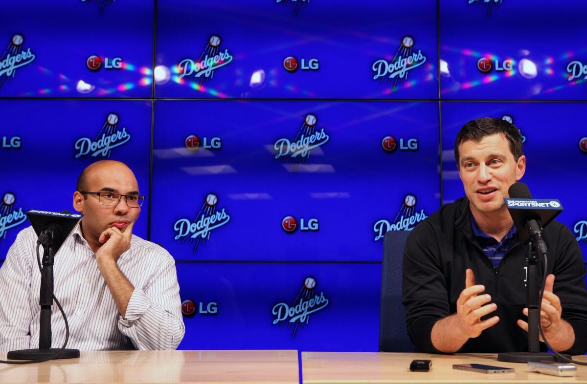 Farhan Zaidi, left, and Andrew Friedman.