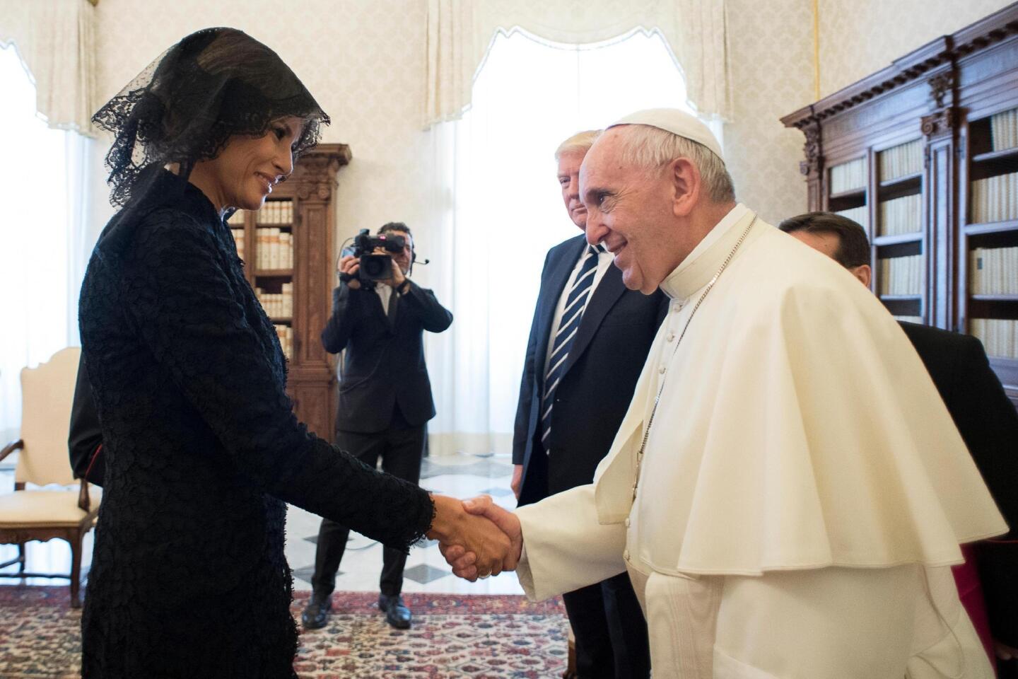 Melania Trump greets Pope Francis
