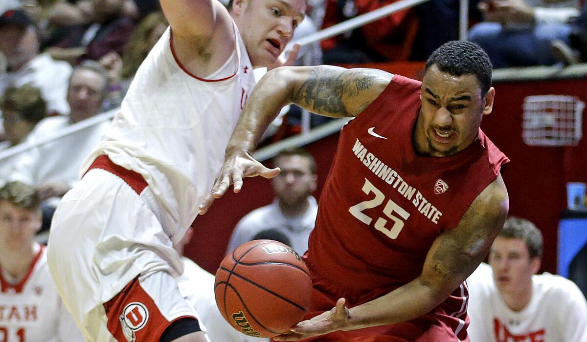 Washington State guard DaVonte Lacy tries to drive past Utah forward Jeremy Olsen in the first half Wednesday night.