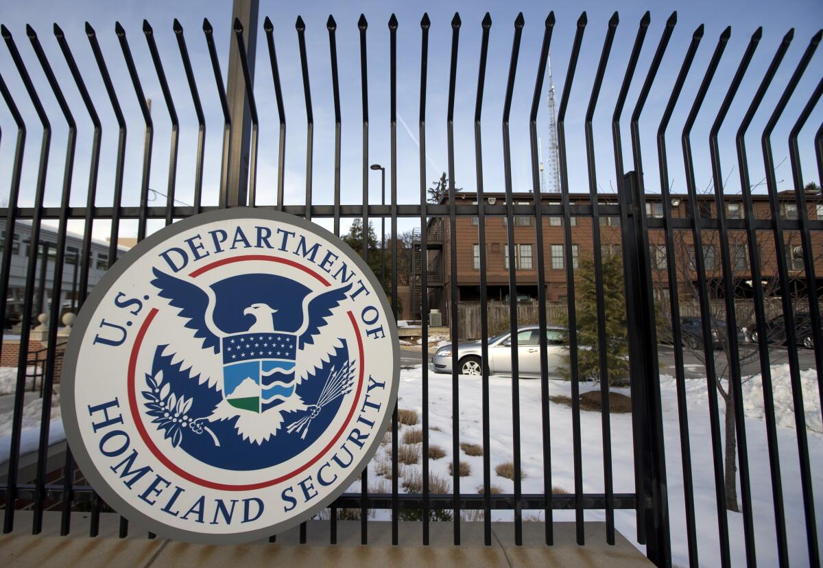 FILE - The U.S. Homeland Security Department headquarters in northwest Washington is pictured on Feb. 25, 2015. A popular Chinese-made automotive GPS tracker used by individuals, government agencies and companies in 169 countries has severe software vulnerabilities, posing a potential danger to life and limb, national security and supply chains, cybersecurity researchers said in a report released Tuesday, July 19, 2022, to coincide with an advisory from the U.S. Cybersecurity and Infrastructure Security Agency listing six vulnerabilities. (AP Photo/Manuel Balce Ceneta, File)