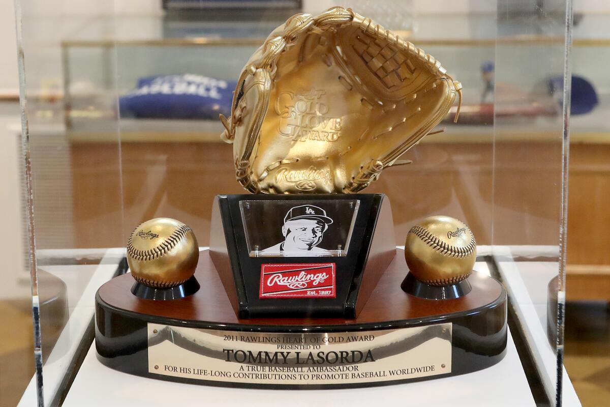 A 2011 Rawlings Heart of Gold award given to Tommy Lasorda at an exhibit at Fullerton Museum Center.