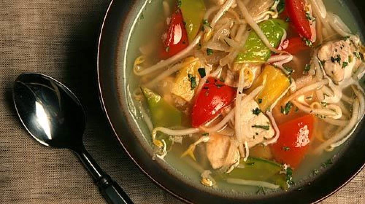 DELIGHTFUL: Vietnamese sour fish soup, bright with tamarind, includes lightly poached catfish and crispy bean sprouts.