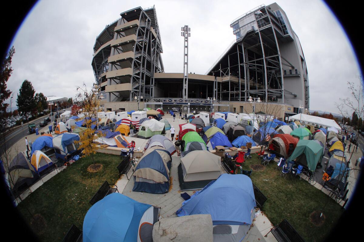 A photo taken with a fish-eye lens shows Penn State students camping out at Nittanyville outside Gate A of Beaver Stadium.