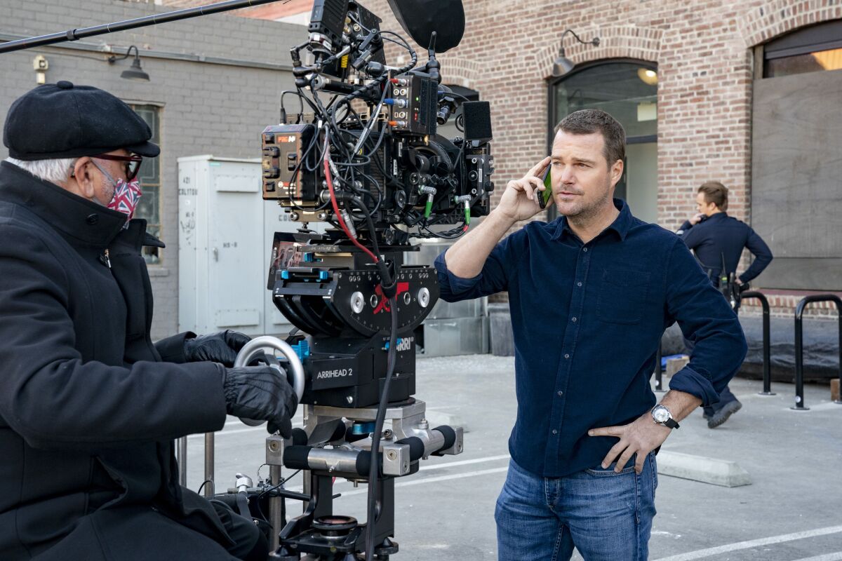 "NCIS: Los Angeles" actor Chris O'Donnell takes a call on set 