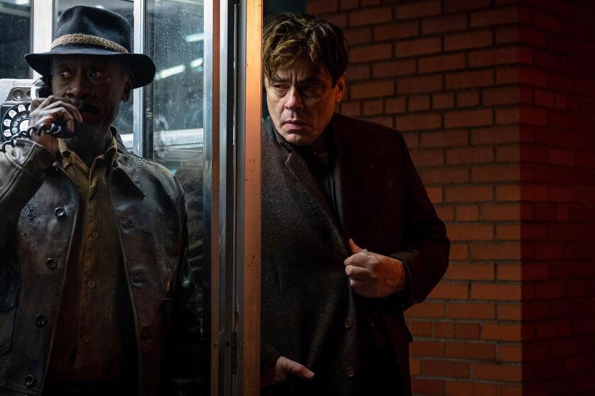 Don Cheadle, left, and Benicio Del Toro in Steven Soderbergh's 'No Sudden Move.'