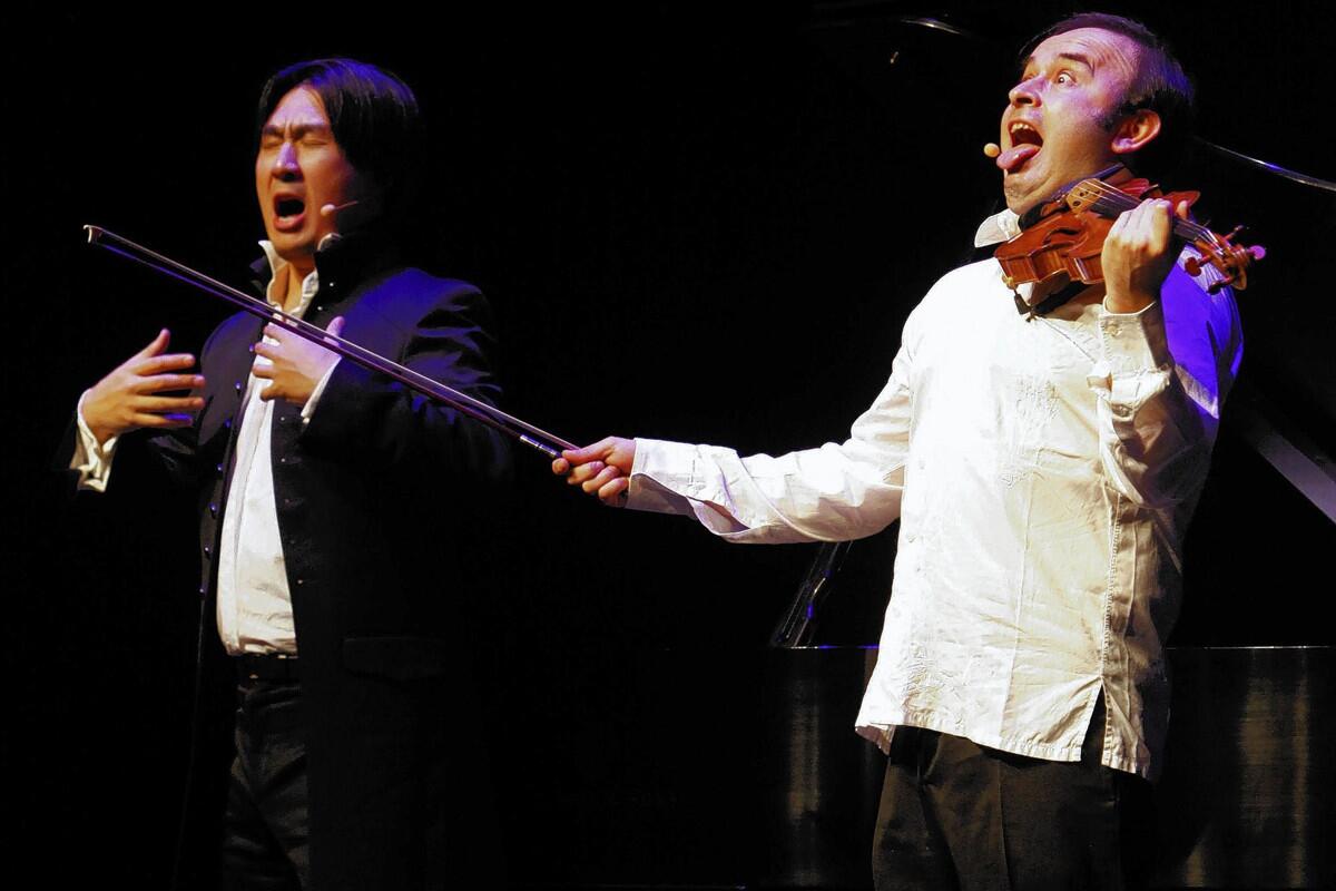 Hyung-ki Joo, left, and Aleksey Igudesman are known as Igudesman & Joo.