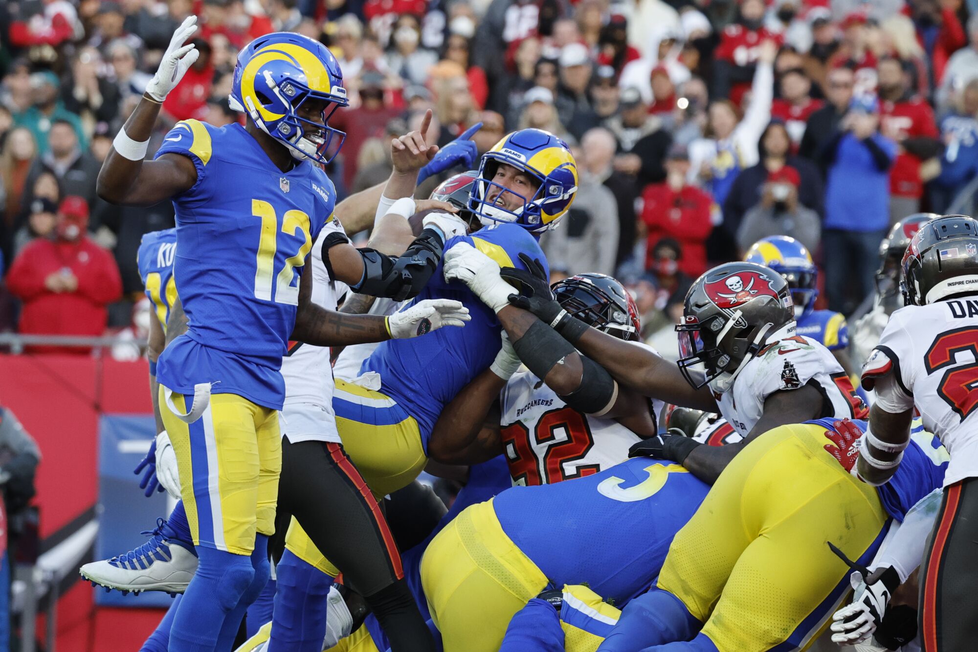 Rams quarterback Matthew Stafford scores on a one-yard touchdown run up the middle.