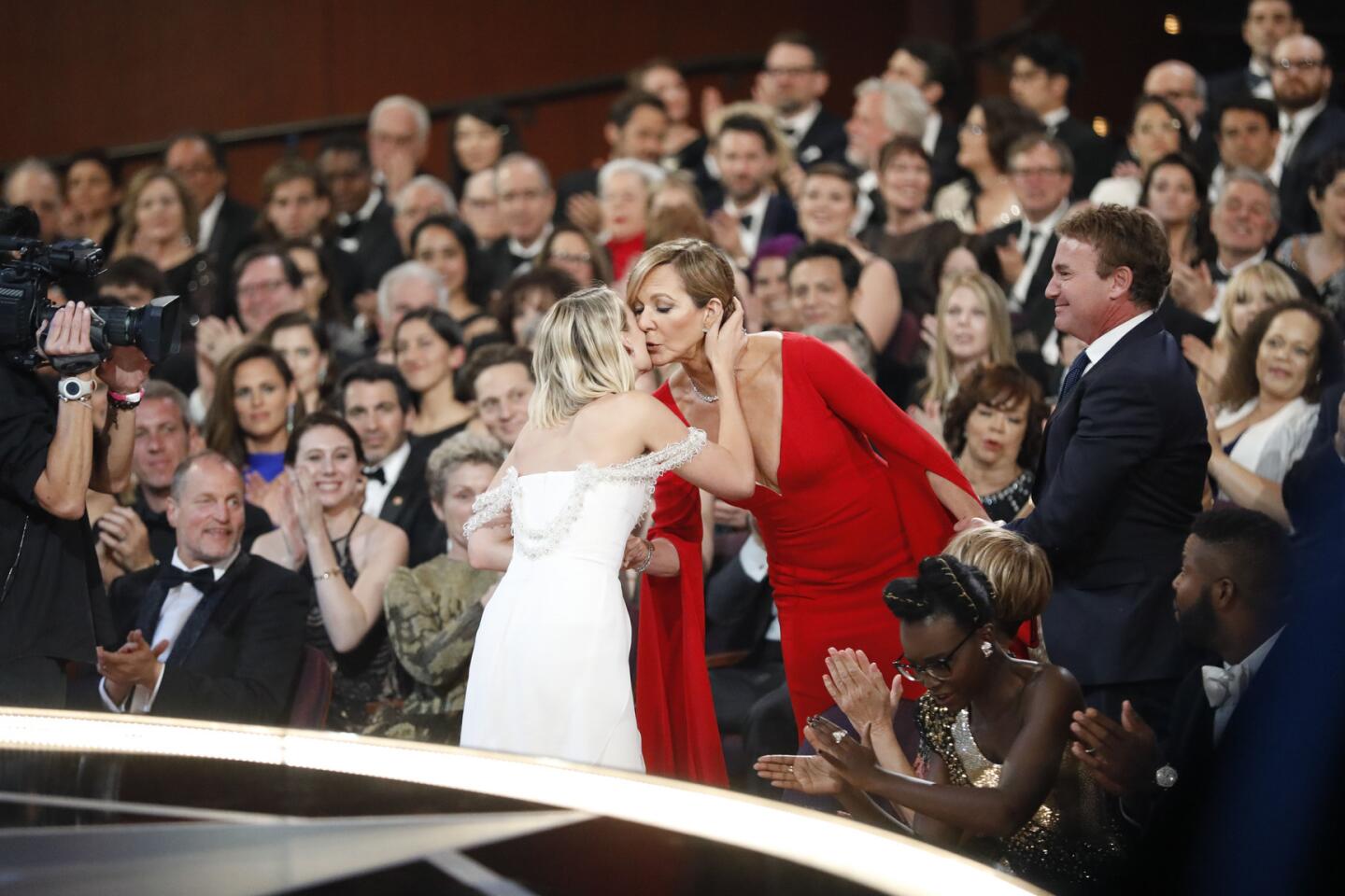 Allison Janney hugs Margot Robbie after Janney won for supporting actress for "I, Tonya," from backstage at the 90th Academy Awards on Sunday at the Dolby Theatre in Hollywood.